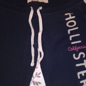 Hollister Navy Sweatpants with White Drawstring and Pink Script